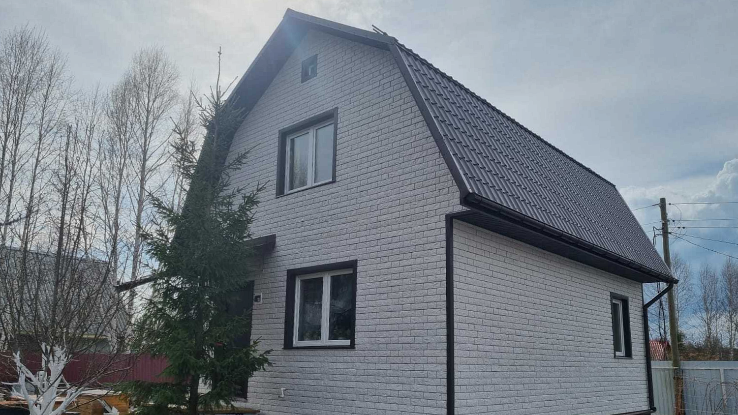 Отделка сайдингом под камень